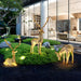 Luminous Deer Silver Steel LED Sculpture - Outdoor setting three deer on the grass