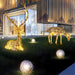 Luminous Deer Silver Steel LED Sculpture - two deer on the grass