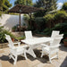 Modern Dining Set for 4 with 4' Table on a patio, surrounded by garden and house - poly luxe - white