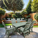 Modern Dining Set for 6 with 6' Tablein a garden setting - turf green - poly luxe
