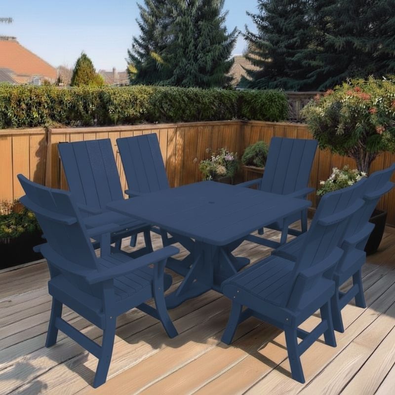 Modern Dining Set for 6 with Pedestal Table on a deck surrounded by greenery - poly luxe - patriot blue