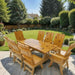 Modern Dining Set for 8 with 6' Table on a patio in a garden setting - knotted cedar - golden glossy