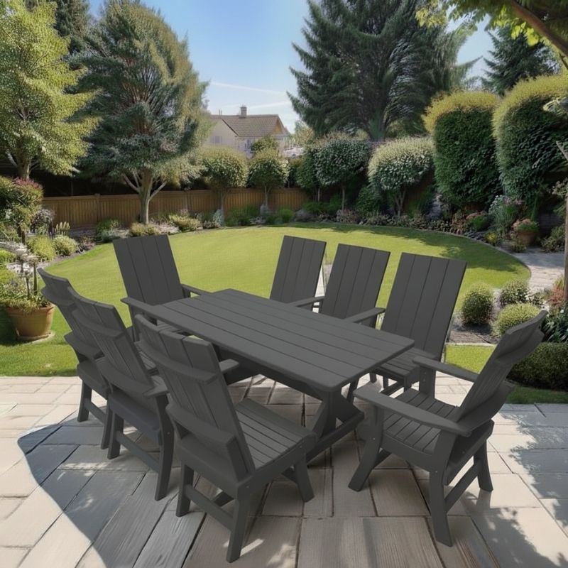 Modern Dining Set for 8 with 6' Table on a patio with a garden and house in the background - dark grey