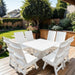 Modern Dining Set for 8 with Pedestal Table on a deck with a garden and house in the background - poly luxe - white