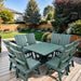 turf green outdoor dining set on a wooden deck with a garden background