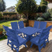 Modern Dining Set for 8 with Pedestal Table on a deck with a garden and house in the background - poly luxe - blue