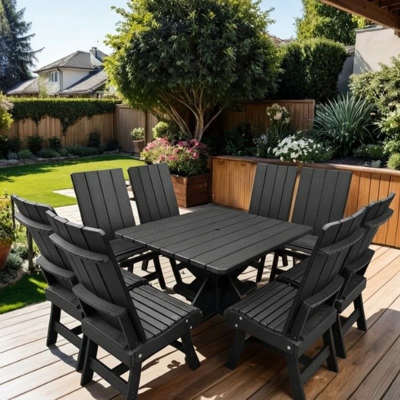 Modern Dining Set for 8 with Pedestal Table on a deck with a garden and house in the background - poly luxe - black