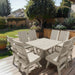 Modern Dining Set for 8 with Pedestal Table on a wooden deck in a garden setting - poly luxe - woodgrain driftwood grey