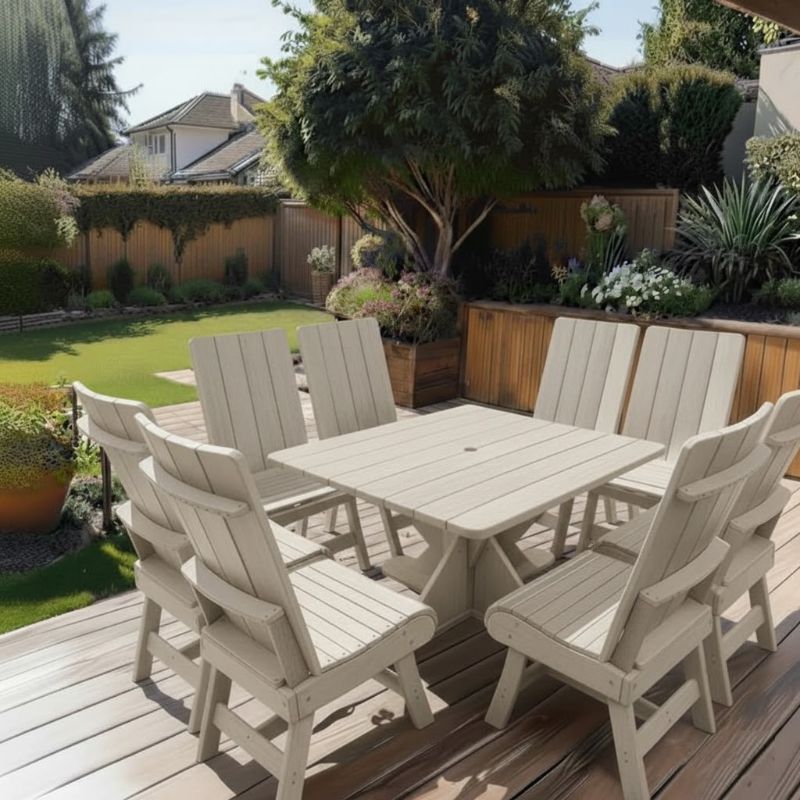 Modern Dining Set for 8 with Pedestal Table on a wooden deck in a garden setting - poly luxe - woodgrain driftwood grey