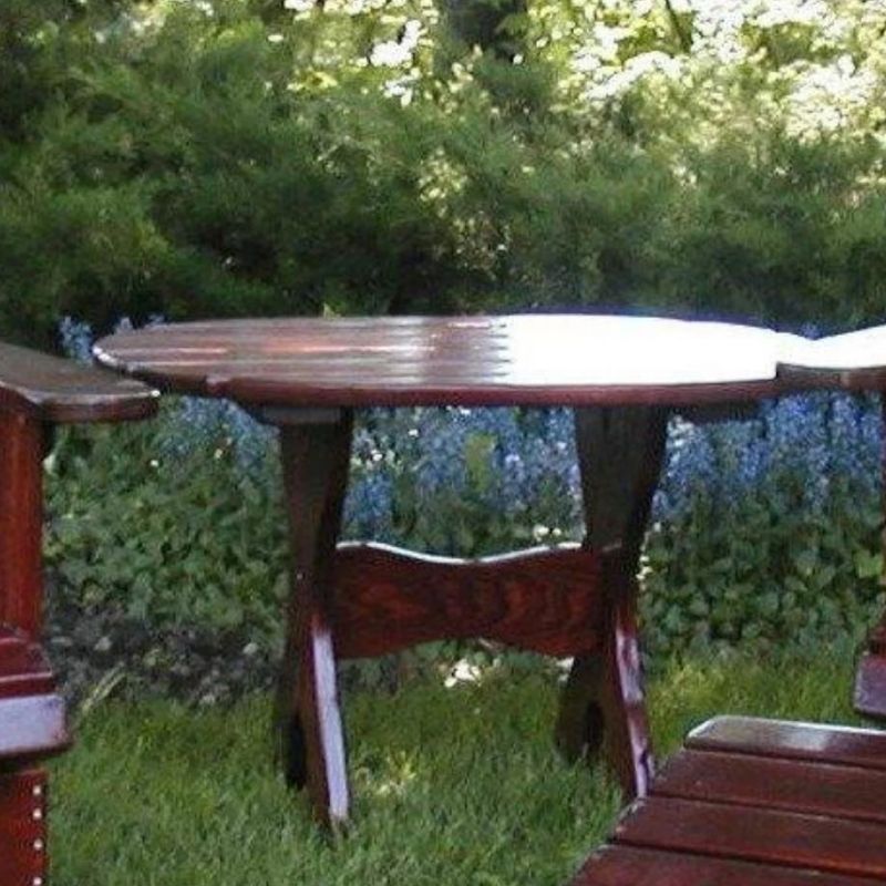 Adirondack chairs with side table outside