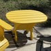 Adirondack chair and wood side table outdoors