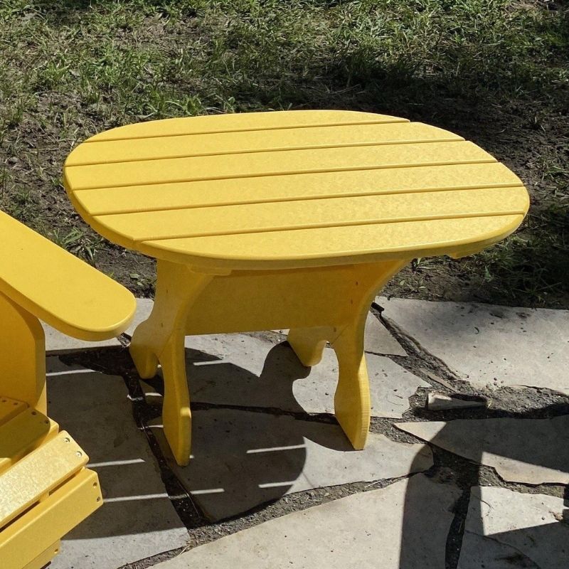 Adirondack chair and wood side table outdoors