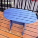 Adirondack chair and side table on patio
