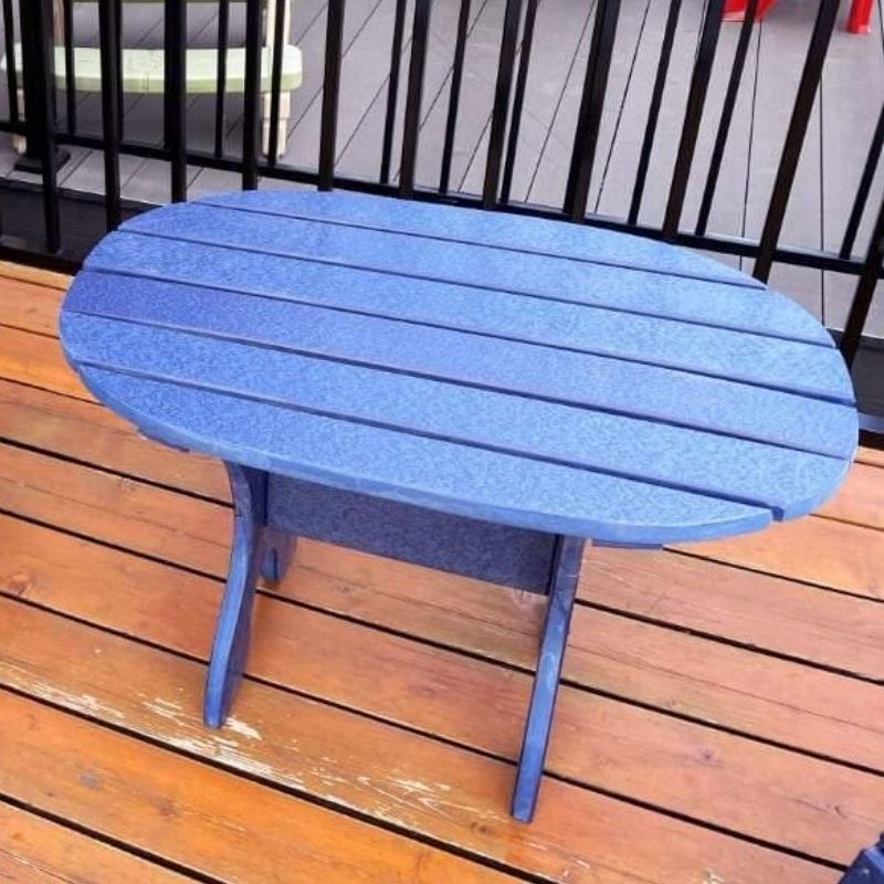 Adirondack chair and side table on patio