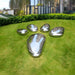 Pebble Organic Outdoor Steel Sculpture outdoor setting with grass