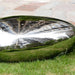 Pebble Organic Outdoor Steel Sculpture close up view with grass