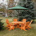 Orange Royal Picnic Set for 6 under a green umbrella on grass.