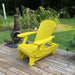 Royal Reclining Glider on a wooden deck with a garden background - poly luxe - lemon yellow