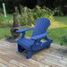Royal Reclining Glider on a wooden deck with a garden background - poly luxe - blue