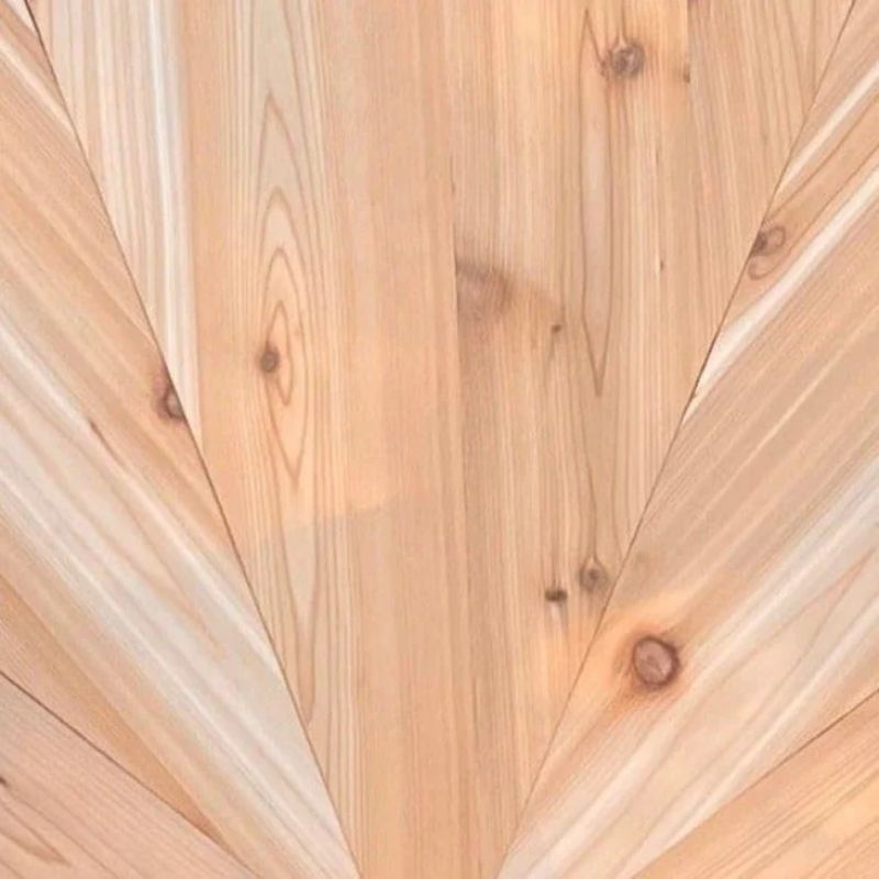 Close-up of a wooden surface with a warm brown color.