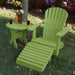 Lime green Royal Single Patio Set set on grass with decorative items.