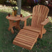 Cedar Royal Single Patio Set set on grass with decorative items.