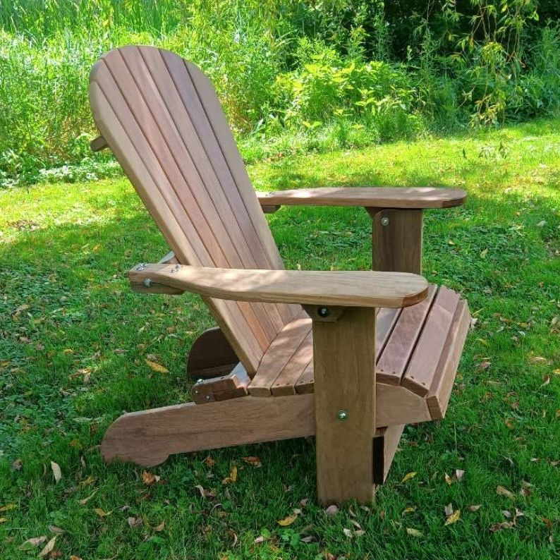 Royal Upright Adirondack Chair, on a grassy outdoor setting