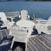 white adirondack chairs and coffee table