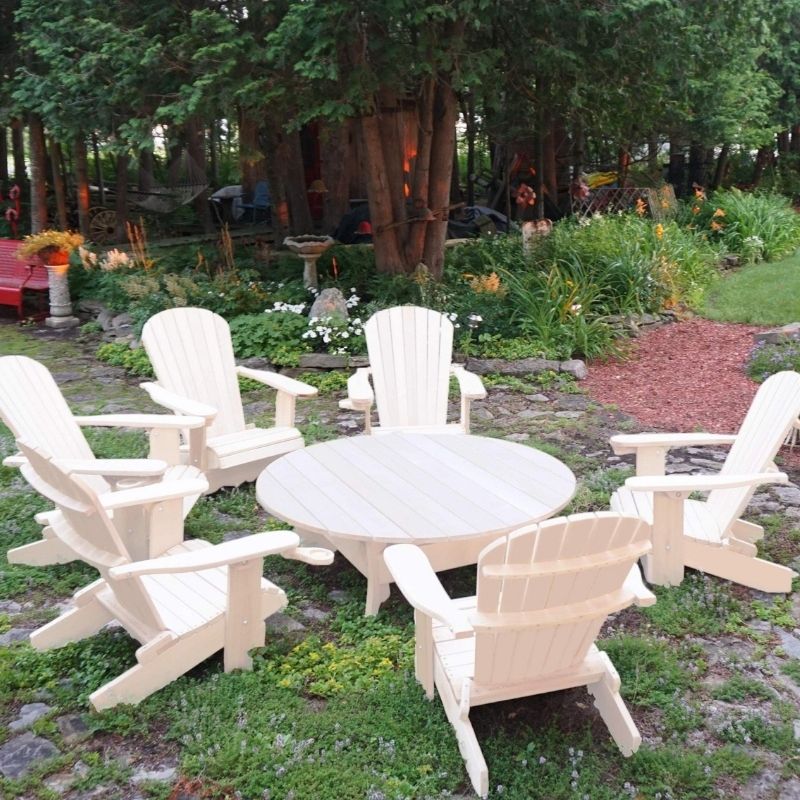 white Adirondack chair set with coffee table