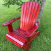 Red Royal Upright Adirondack Chair, on a grassy area with a tree in the background